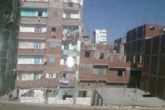Buildings as seen from train between Cairo and Alexandria