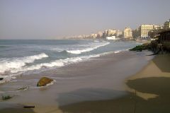 Alexandria Mediterranean Beach With Urban Skyline