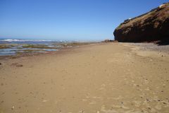 Wide Sandy Beach Beneath Red Cliffs, Sidi Ifni