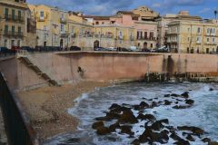 A very small beach in Syracuse on Ortygia, Sicily, Italy