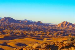Desert landscape at sunset  at Valley of a Thousand Hills Campsite in Namibia