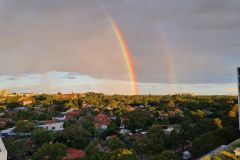 Sunset Double Rainbow Over Urban Canopy, Australia