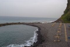 Quiet Pebble Beach and Breakwater in Ponta do Sol, Madeira