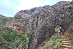 Rock tunnel and stairway on PR1 Vereda do Areeiro near Pico Ruivo, Madeira, Portugal