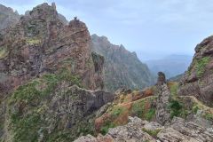 Exposed ridge and switchback section on PR1 Vereda do Areeiro, Madeira, Portugal