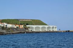 Harbor Breakwater and Arched Seafront in Santa Cruz, Madeira