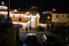 Illuminated Traditional Houses on Madeira Island at Night