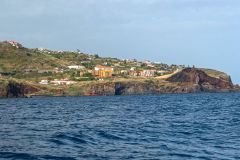 Rocky Coastal Cliffs and Hillside Settlement on Madeira Island