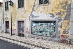 Weathered Façade with Newspapered Window, Ribeira Brava, Madeira