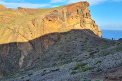 Hiking Trail Beneath Sunlit Volcanic Cliffs, Ponta de São Lourenço, Madeira