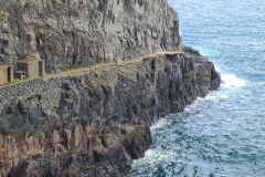 Abandoned Cliffside Shelters and Coastal Path near São Jorge, Madeira