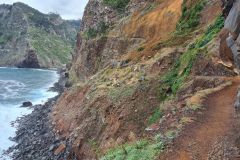 Narrow Coastal Path Carved into Volcanic Cliffs near São Jorge, Madeira