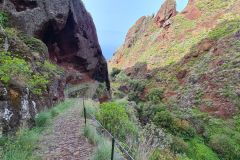 Cliffside Path Beneath Volcanic Overhang on Caminho Real, Paul do Mar, Madeira