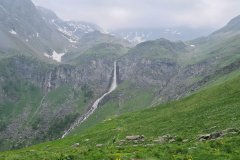Spring Alpine Valley with Waterfalls in the Italian Alps