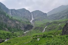 Spring Waterfall Basin in a Remote Alpine Valley of the Italian Alps