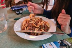 Hearty Pasta Dish Served in a Mountain Restaurant of the Italian Alps