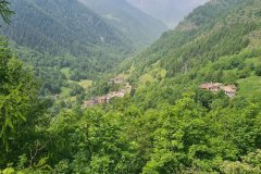 Remote Alpine Villages Nestled in a Forested Valley of the Italian Alps