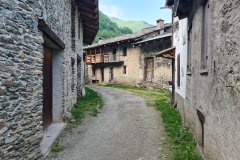 Stone Village Lane in a Secluded Alpine Valley Settlement