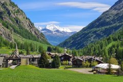 Valnontey Village with Gran Paradiso Glacier Framed Between Alpine Slopes