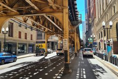 Downtown Chicago Street under Elevated “L” Tracks