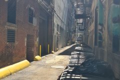Chicago Downtown Alley with Trash Bins and Fire Escapes, Illinois, United States