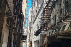 Chicago Downtown Alley with Pedestrians and Fire Escapes, Illinois, United States