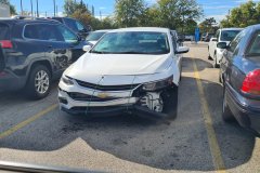 Damaged Sedan in Retail Parking Lot, Oak Brook, Illinois