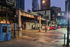 Night Street Scene Beneath Elevated Tracks, Downtown Chicago, Illinois