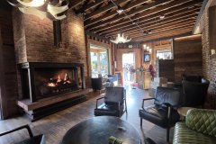 Historic Brick-and-Timber Lounge with Fireplace, Downtown Golden, Colorado — Front Range Hospitality Interior