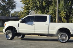 Lifted Full-Size Pickup on Residential Street