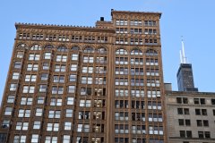 Historic Chicago Office Building with Willis Tower in the Background