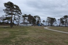 Quiet Coastal Park with Playground and Winding Path