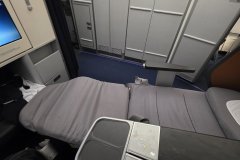 Early-Winter Long-Haul Comfort — Fully Reclined Business Class Seat, Lufthansa