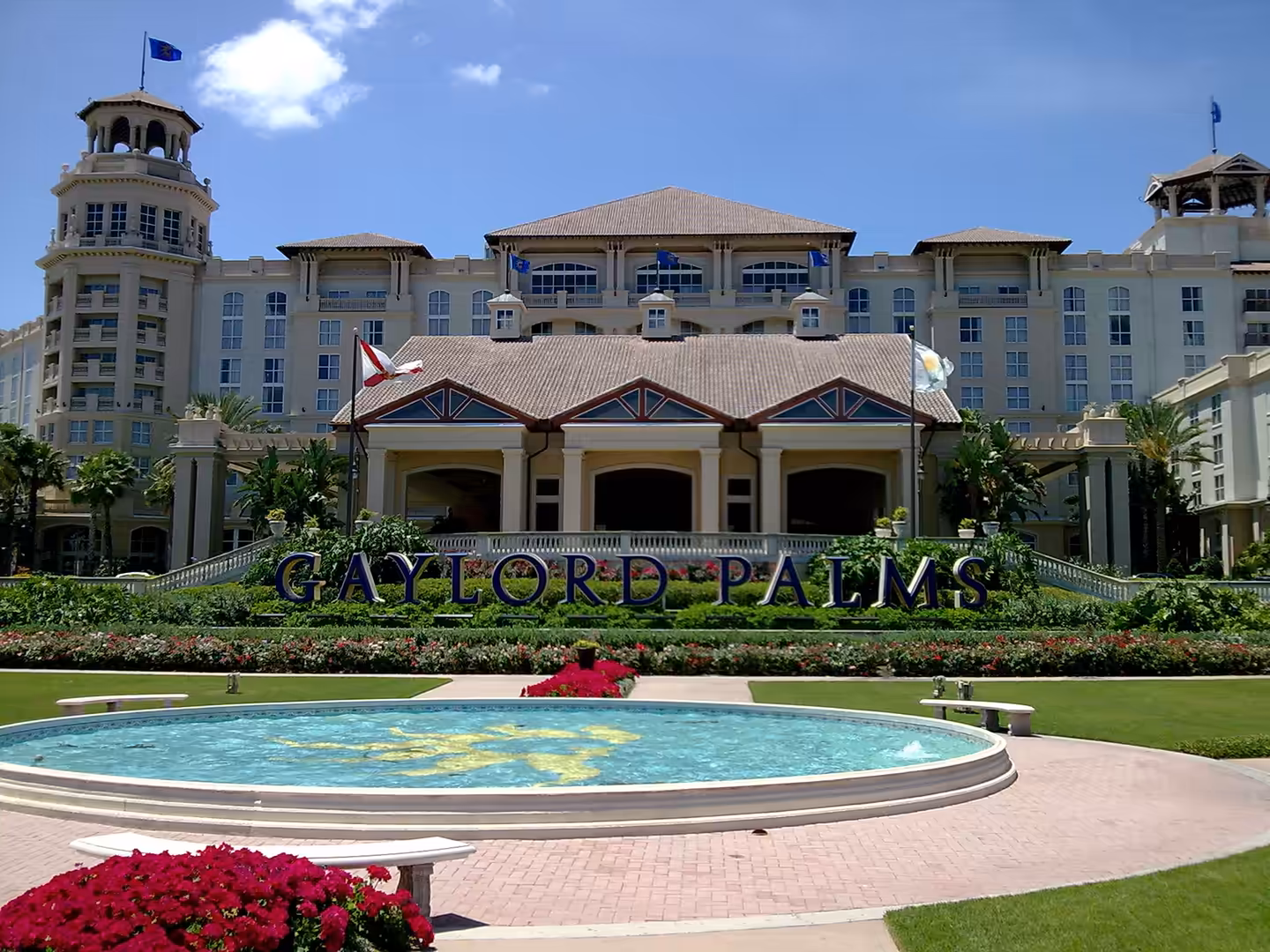 Front entrance of Gaylord Palms Resort near Orlando, Florida, with fountain and landscaped gardens.