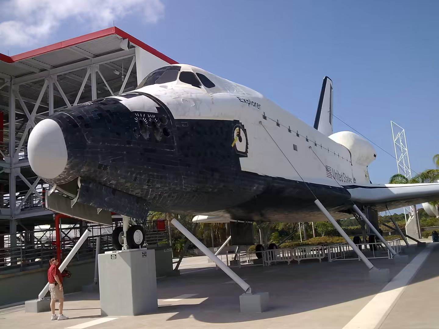 Full-size Space Shuttle Explorer exhibit displayed outdoors at Kennedy Space Center.