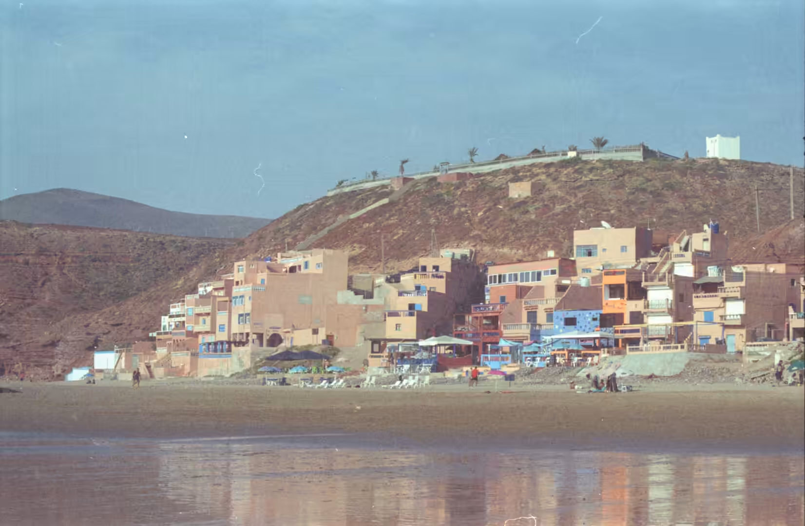 Colorful coastal village along a beach in Morocco