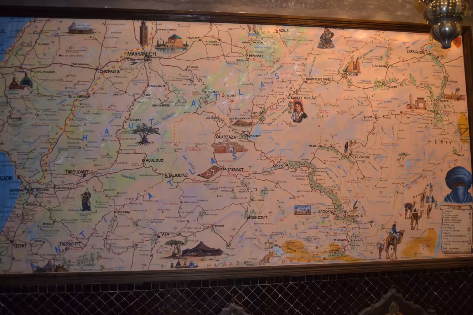 Decorative wall map showing Atlas Mountains and surrounding regions near Marrakech