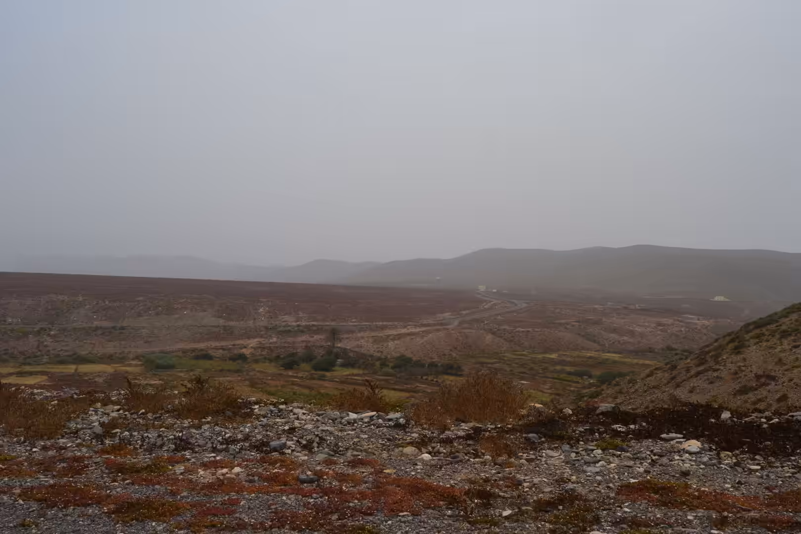 Winding road through arid valley south of Sidi Ifni
