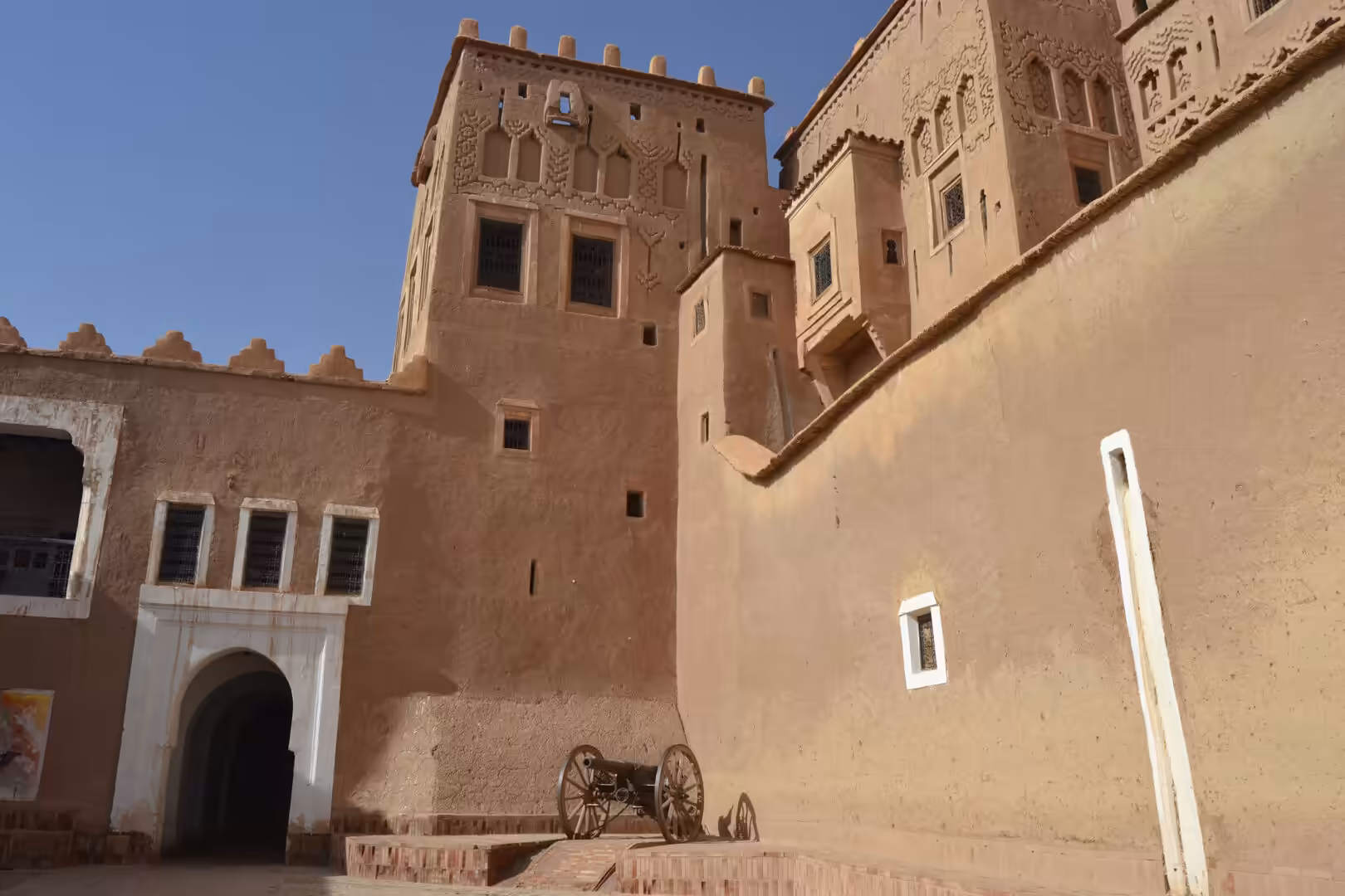 Tower and walls of Taourirt Kasbah courtyard