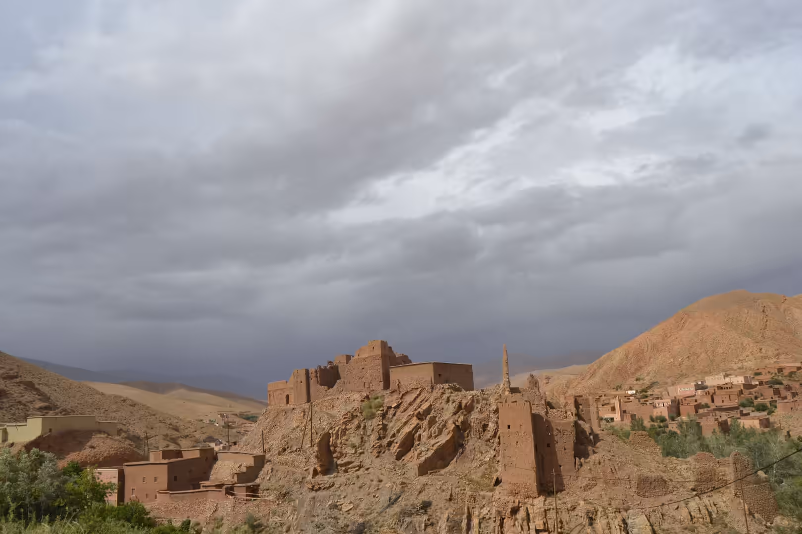 Ancient kasbah ruins on rocky hill in Atlas Mountains