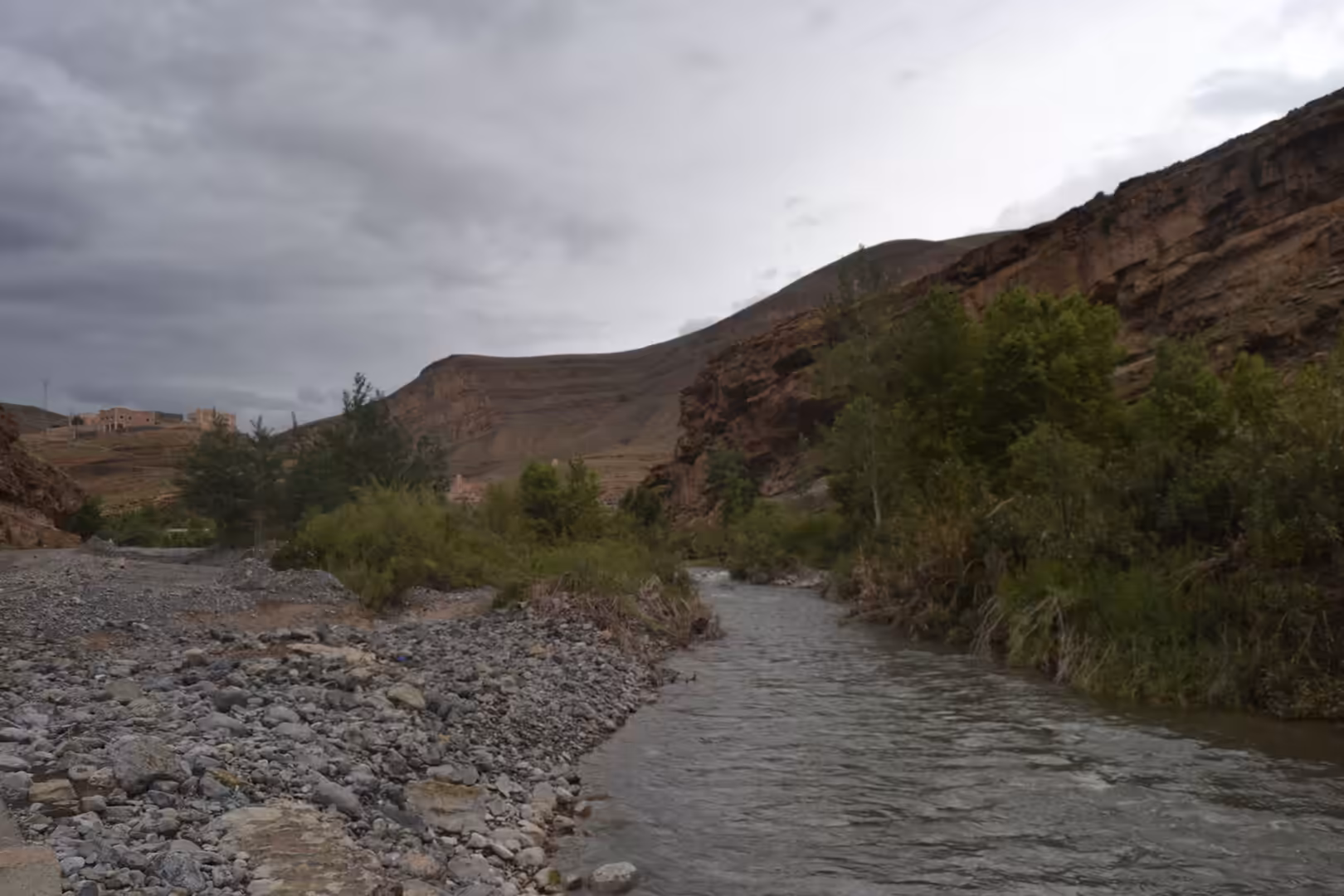 Mountain stream flowing through valley in Atlas Mountains