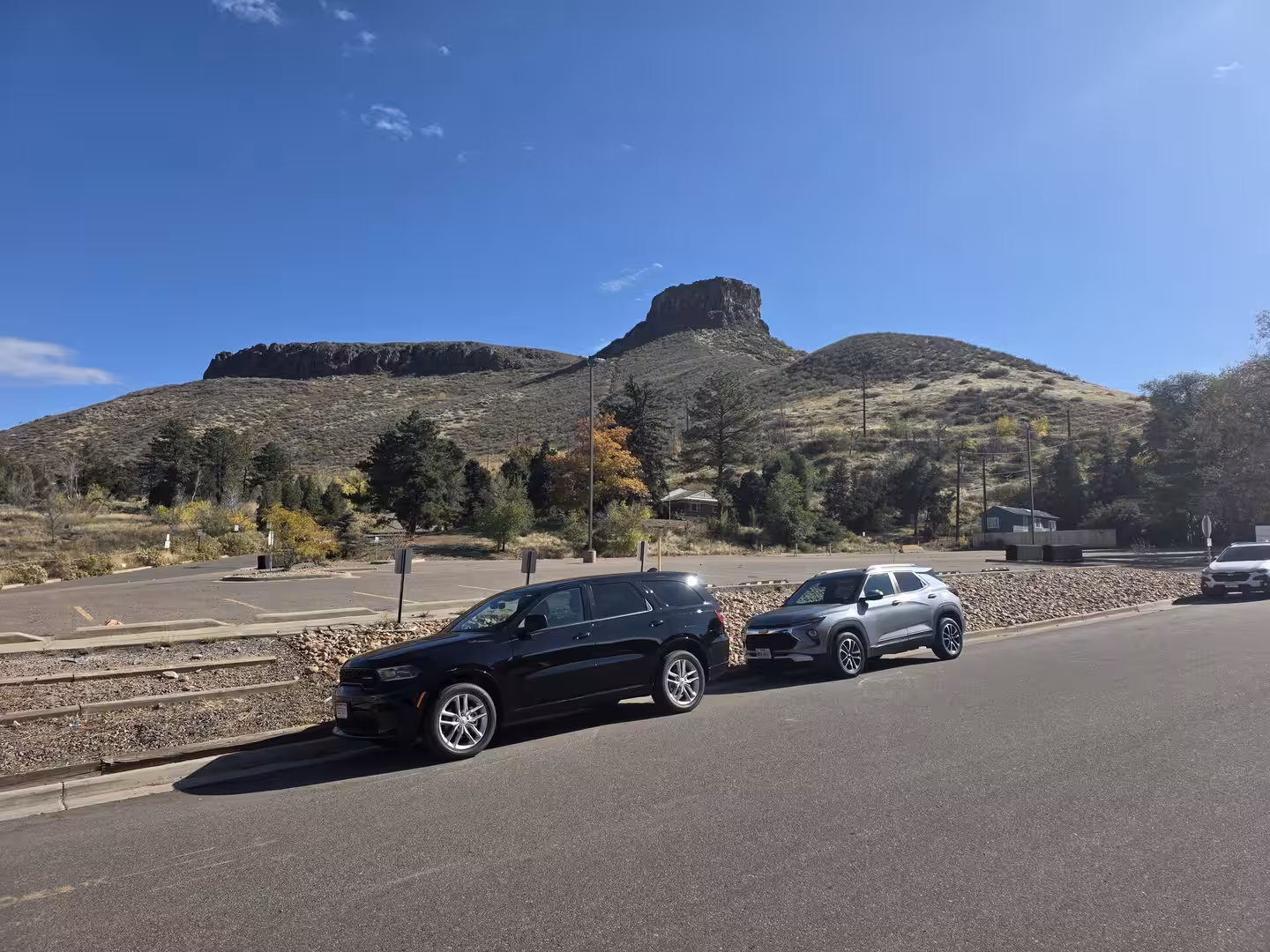 Distinct flat-topped rock formation rising above the hills near Golden, Colorado