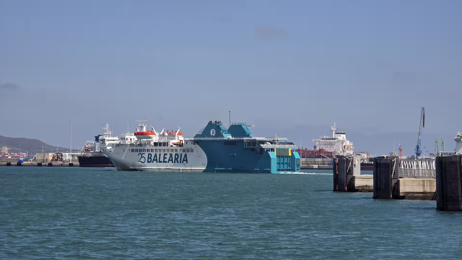 Balearia ferry maneuvering in the harbor of Algeciras, Spain.